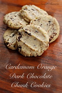 some cookies are stacked on top of each other with the words grandma orange dark chocolate chunk cookies