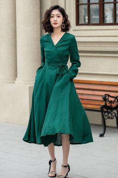 "This elegant green linen dress combines style and comfort. The full, flowy skirt ends just below the knees, adding a timeless charm to the dress. Perfect for a variety of occasions, this dress is a versatile addition to any wardrobe. DETAILS * 100% linen * Two Seam pockets * V-neck collar * No buttons, tie by the string * A Line dress, Wrap dress * Mid-calf length * Perfect for Summer, Spring * Wash by hand or machine with cold water, Ironing after dry Choose CUSTOM Order if you * Need a better Spring Green Solid Midi Dress, Spring Green Solid Color Midi Dress, Dark Green Long Sleeve Midi Dress For Spring, Casual Dark Green Midi Dress For Spring, Green A-line Solid Color Midi Dress, Dark Green Midi Length Spring Dress, Dark Green Midi Length Dress For Spring, Dark Green Knee-length Summer Dress, Dark Green Knee-length Midi Dress For Summer