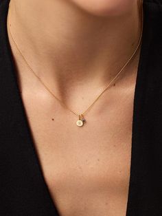 The stars have aligned in this celestial-inspired gold pendant necklace. Crafted in solid gold, this waterproof and tarnish-free set features a dainty gold ball chain with two charms--one gold star charm with a lab-grown diamond and one mini birthstone charm with a sapphire gemstone. Tie your look together with the perfect pop of color and pair this set with our Gold Huggie Hoops for a timeless finishing touch. The Gold Midnight Star Necklace includes three pieces: Dainty Gold Necklace - Gold Ball Chain Necklace, Gold Pendant - Gold Star Charm, & Birthstone - Gold Mini Birthstone Charm. • Crafted in recycled solid gold • Set of one necklace & two charms • Lab-grown diamond & sapphire gemstone Ball Chain Necklace Gold, Simple Gold Necklace, Gold Ball Chain, Necklace Gold Pendant, Diamond Charm Necklace, Dainty Gold Chain, Gold Necklace Simple, Mini Necklace, Solid Gold Necklace