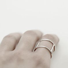 Handmade sterling silver ring consisting of two bands connected with three parallel bars. The ring is completely handmade, no casting included.Overall width: 15mmBand width: 1.2mmCan't find your size? Contact us for a custom order.Also available in oxidized silver:https://www.etsy.com/listing/202552361/personal-armor-02-oxidized-sterlingVisit my shop for more similar items: http://www.etsy.com/shop/jewelrymirta© MIRTA Minimalist Silver Double Band Jewelry, Modern Sterling Silver Open Ring Midi Rings, Modern Sterling Silver Open Midi Rings, Minimalist Sterling Silver Bands For Everyday, Minimalist Silver Stackable Rings With Open Band, Silver Open Ring Stackable Rings In Minimalist Style, Minimalist Double Band Promise Ring, Minimalist Silver Ring With Simple Design, Minimalist Silver Open Band Stackable Rings