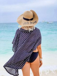 Custom saying floppy beach hat! This hat is sure to impress your friends whether it's just for a day on the water, at the pool, or the perfect gift for a bachelorette weekend!Hat Details: Black writing and black ribbon band with a bow. Beige hat, 15 in wide (~4.5 brim) One size fits most - this hat fits about 22" head Wording Ideas // See Customer PhotosWording Details: Wording is adhered with custom cut premium permanent vinyl (not embroidered) You are responsible for proofing your text before Wording Ideas, Floppy Beach Hat, Beach Weekend, Beige Hat, Floppy Hats, Beach Honeymoon, Hat Fits, Black Writing, Bachelorette Trip