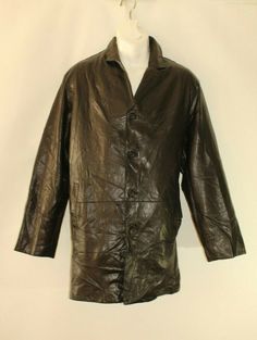 "Vintage Black Crinkle Soft Leather MURANO Button Biker Casual Jacket   size - L FULL LENGTH - 33.25\"( 84.5 cm  ) ARMPIT TO ARMPIT - 25.5\"(64.8 cm  ) MEASURED BACK OF THE JACKET SLEEVE LENGTH FROM ARMPIT TO CUFF - 18.25\" ( 46.3 cm ) SLEEVE LENGTH FROM SHOULDER TO CUFF - 25\" ( 63.5 cm ) SHOULDER TO SHOULDER ACROSS - 20\" ( 50.8 cm  ) The jacket is used but in Good condition , please see all pictures. ################ *Please note that most of my items are vintage and has therefore been previo Casual Long Sleeve Biker Jacket With Button Closure, Casual Long Sleeve Biker Jacket With Buttons, Casual Long Sleeve Biker Jacket, Casual Leather Jacket With Buttons For Winter, Casual Winter Leather Jacket With Buttons, Black Casual Leather Jacket With Snap Buttons, Casual Black Leather Jacket With Snap Buttons, Casual Workwear Biker Jacket With Buttons, Casual Black Leather Jacket With Buttons