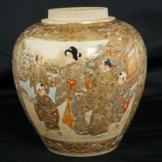 A very intricately decorated Japanese satsuma ginger jar that glows from all of the gold decoration.   A ceramic has been glazed with a fine crackle buff glaze and then decorated with overglaze enamels and gilt. The decoration is minute and the intricacy is overwhelming. The two main panels depict detailed scenes of court life with Geisha and Samurai. These panels are surrounded with detailed fabric designs in gold.. The mouth and neck are not glazed and would have had a fitted lid.    The flat Pottery Japanese, Satsuma Vase, Japanese Vase, Meiji Period, Japanese Porcelain, Japanese Pottery, Japanese Ceramics, Floor Vase, Japanese Antiques