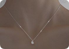 Sterling Silver Jewelry With Delicate Chain And Oval Pendant, Silver Teardrop Pendant Necklace For Formal Occasions, Elegant Silver Water Drop Earrings, Simple Sterling Silver Jewelry For Formal Occasions, Dainty Teardrop Sterling Silver Charm Necklace, Elegant Silver Teardrop Drop Necklace, Dainty Sterling Silver Teardrop Charm Necklace, Simple Design Sterling Silver Necklace, Minimalist Silver Long Drop Necklace