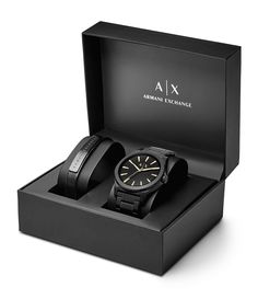 From AX Armani Exchange&#x2C; this watch features:black IP stainless steel braceletblack IP stainless steel round casematte black sunray dial with beveled index ring and gold-tone indexesquartz analog movementapprox. 44mm case size; 22mm bracelet width5 ATM water resistanceblack leather strap with logo-engraved black IP bar plaque includedImported. Men's Cheap Digital Watch With Subdials, Groomsmen Gifts For Under 21, Personalized Gifts Bf, Gifts For Ya Man, Groom Gift From The Bride Watch, For Him Gifts Boyfriends, Boyfriend Anniversary Gifts One Year For Him, Best Gifts For Men Boyfriends, Cool Gifts For Men Zazzle