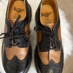 Unisex Vintage Dr. Martens 3979/34 Leather Wingtip Black & Gold Brogue Oxford Made In England. Uk 5 Women’s Us 7 Men’s Us 6 Great Condition Evident By Soles, Laces And The Print Inside Shoe Isn’t Worn Out. Dr Martens 3989, Two Tone Brogues, Dr Martens Vintage, Vintage Dr Martens, Inside Shoes, Summer 2025, Dr Martens Black, Popular Shoes, Shoes Vintage