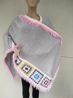 Boho knitted Poncho Oversize women poncho Luxury hand knitted poncho hippie poncho Colorful  Poncho Asymmetric Top, Women Tunic Top, Winter Blouse, Long Sleeve Top, Knitted Top, Women Sweater Dress, Plus Size Top, Loose Top,Cover up Hand Knit  Poncho   When knitting this poncho, I used only high-quality yarn that never sheds and will not change during wear. Wool, angora, cotton, premium acrylic are used here. Perfect for winter. One size fits all.  I do hand knit and  are in a pet-free and smoke One Size Acrylic Poncho Shawl, One Size Bohemian Pink Poncho, Bohemian Knitted Shawl For Beach, Bohemian Hand Knitted Poncho For Beach, Bohemian Poncho In Yarn One Size, Hand Knitted Bohemian Poncho For Beach, Bohemian One Size Yarn Poncho, Bohemian Winter Cape One Size, Bohemian Style Yarn Poncho One Size