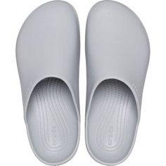 The Dylan Clog melds the classic styling of mules with the unbelievable comfort of Crocs' classic Croslite material. The soft cushioning of the footbed keeps our feet fresh for long walks along the boardwalk or hours of chores around the house and backyard. The easy slip-on style stays next to the door so we can slide them on as we head out of the house, but there's no guarantee we'll want to take them off when we get back home. Slip-resistant Round Toe Slides In Solid Color, Comfortable Solid Color Slides With Rubber Sole, Comfortable Closed Toe Synthetic Slides, Comfortable Synthetic Closed Toe Slides, Non-slip Synthetic Slide Clogs, Comfortable Lightweight Slides With Round Toe, Gray Non-slip Slip-on Slides, Comfortable Synthetic Clogs With Rubber Sole, Lightweight Comfortable Slides With Round Toe