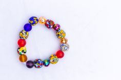 This is a beautiful handmade beaded elastic bracelet handmade with love. It measures about 9.5 inches in circumference pre stretched and It is a great compliment for all outfits. This beautiful bracelet makes a great gift for a loved one. Hand-strung Multicolor Beads For Gifts, Colorful Beaded Bracelets With Spacer Beads As Gift, Multicolor Beaded Stretch Bracelet For Friendship, Multicolor Stretch Bracelet For Friendship, Colorful Bracelets With Spacer Beads For Gifts, Colorful Bracelets With Spacer Beads As Gift, Hand-strung Multicolor Stretch Bracelet For Friendship, Colorful Faceted Beads Bracelets As Gift, Multicolor Hand-strung Stretch Bracelet For Friendship