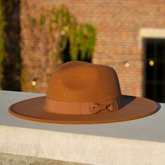 Introducing our new Tori line of fedoras, which feature an enlarged brim compared to a traditional fedora, as well as a stylish handstitched bowtie headband Available in a large selection of colors, so there is a brim for any occasion Adjustable inner-headband to ensure the perfect fit Available in size Medium 54-58cm and Large 59-61cm Specifications:Crown Height: 5"Brim Width: 3.75"Material: Polyester All hats ship from Dallas, Texas. Womens Fedora, Wide Brim Fedora, Fedora Hat, Dallas Texas, Wide Brimmed, Fedora, Dallas, Polyester Fabric, Perfect Fit