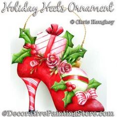 a christmas shoe with holly and candy canes on the heel is featured in this holiday card