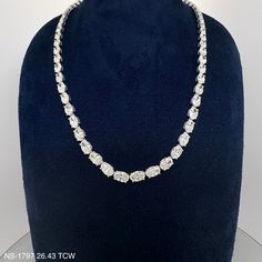 Indulge in luxury with our 26.43 Cts. Natural Oval Diamond Tennis Necklace. Crafted with exquisite precision, this timeless piece is adorned with natural oval diamonds, exuding elegance and sophistication. Own a piece of art that glimmers and shines, making you the center of attention at any event. DIAMOND 26.43 OV TCW 65 PCS. F-G SI1-SI218K WG 25.43 GRAMS SIZE 16.25" NS-1797 Tenis Necklace, Eternity Necklace, Diamond Tennis Necklace, Tennis Necklace, Diamond Eternity, Oval Diamond, Timeless Pieces, Natural Diamonds, Size 16