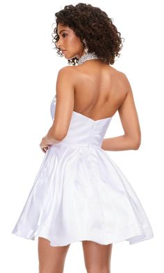 You will be an enchanting beauty in Ashley Lauren 4644 masterpiece. This simply adorable dress is made of satin and features a strapless bodice with a surplice pleated sweetheart neckline. The back highlights the mid-open detail to show some skin and is closed by a hidden zipper. This also includes an eye-catching fully beaded choker, adding sparkle and style to this outfit. Completing this ensemble is a pleated A-line skirt that flows into the mid-thigh hem. This Ashley Lauren 4644 creation is truly a definition of glamour. Models are wearing the Black, Red, and White colors. Style: asla_4644 Fabric: Satin Details: Strapless, Fully Beaded Choker, Pleated, Mid-Open Back, Back Zipper, Horsehair Hem Length: Short Neckline: Sweetheart Waistline: Natural Silhouette: A-Line Please refer to our Velvet Evening Gown, Ashley Lauren, Satin Cocktail Dress, Strapless Gown, Pleated Bodice, Dress Purchase, Designer Gowns, Homecoming Dress, Beaded Choker