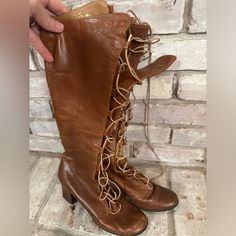 Have Lots Of Age And Wear. Parts Of The Leather On The Heel Is Damaged. Very Hard To Find Boots. We Do Not See A Size Marked On The Boots But The Lady Who Owned Them Wore A Size 7.5 Or 8. Leather Round Toe Heels With Laces, Vintage Leather Lace-up Boots With Pointed Toe, Leather Heels With Laces And Round Toe, Leather High Heel Boots With Laces, Pointed Toe Leather Boots With Lacing, Spring Leather Lace-up Boots With Low Heel, Leather Boots With Lacing And Pointed Toe, Vintage Leather Lace-up Boots For Spring, Leather Boots With Laces And Closed Toe