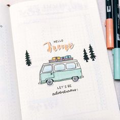 an open notebook with the words hello june written on it and a drawing of a camper van