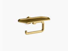 a gold toilet paper holder on a white background