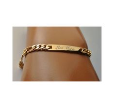 "This engraved delicate gold bracelet makes a great personalized gift for that special someone. This personalized bracelet can be custom engraved on both sides with names, initials, dates or a message of love.  Stainless Steel Figaro Link ID Bracelet Bracelet Length: 7 1/2 or 7\" please let us know please let us know the size your would prefer or we will ship the 7 1/2 inch one Can Be Made To Fit Smaller Wrist Sizes Upon Request Please let us know if you need a different size (please measure wrist prior to purchase) Material Finish: Gold Plated High Polished Stainless Steel Plaque Dimensions: 1.5\" x 0.2\" Clasp Type: Lobster We can fit only 1 logo from our stock if it is requested Upon purchase you can send the text you would like engraved along with the font style in a message. If the en Handwriting Signature, Personalized Gold Bracelet, Delicate Gold Bracelet, Custom Engraved Bracelet, Ladies Bracelet, Medical Bracelet, Personalized Bracelet, 1 Logo, Bracelet Women