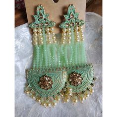 Beautiful Long Indian Style Earrings Beutiful Meenakari And Pearl Work Heavy Design But Light Weight Suitable For Any Dress And Occasions 4 1/5 Inches Long Have So Many Other Colors Pls Check My Listings For More Color Options Traditional Green Beaded Earrings For Party, Traditional Green Beaded Party Earrings, Green Dangle Chandbalis For Festivals, Green Danglers For Festival Celebrations, Green Danglers For Festivals And Celebrations, Green Danglers For Celebrations And Festivals, Green Danglers For Celebration At Festivals, Traditional Dangling Beads Earrings For Celebration, Traditional Earrings With Dangling Beads For Celebration