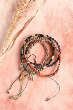 Take your style up a notch with this stackable beaded and woven cord bracelet. The adjustable design ensures a perfect fit, while the boho style and cute, vibrant colors add a touch of fun to any look. Don't miss out on this must-have accessory! 40% Cotton, 30% Glass, 20% Iron, 10% Zinc 100% Handmade in India Mountain Bracelet, Bracelets Stack, Mountain Mama, Suede Bracelet, Hippie Bracelets, Stylish Bracelet, Beaded Drop Earrings, Cord Bracelet, Crystal Drop Earrings