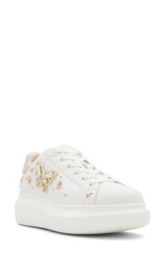 Sparkling studs and butterflies make a delightful statement on a platform sneaker that's sure to stand out from the crowd. Lace-up style Synthetic upper/leather and synthetic lining/synthetic sole Imported Spring White Platform Sneakers With Studded Outsoles, White Platform Sneakers With Studded Outsoles For Spring, Embellished Low-top Synthetic Sneakers, Embellished Synthetic Low-top Sneakers, Embellished Leather Lace-up Sneakers, Embellished Leather Sneakers With Round Toe, Embellished Low-top Sneakers For Spring, Embellished Leather Sneakers, Casual White Sneakers With Studs