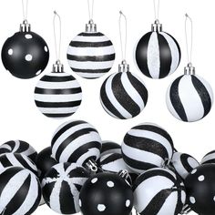 black and white christmas ornaments are arranged in the shape of ball ornament,