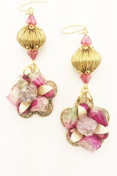 "A lovely set of earrings that reflect a retro / vintage time.  These are made from a vintage pair of clip on earrings and embellished with vintage components.    These have an elegant and classy look and feel.  These will arrive beautifully packaged and ready for gift giving if desired.  Measurements:  Length, not including ear wire is 2-3/4\" long Width - 1\" at widest point" Vintage Pierced Earrings For Festive Occasions, Vintage Metal Earrings For Festive Occasion, Retro Brass Jewelry With Matching Earrings, Vintage Dangle Chandelier Earrings For Festive Occasions, Vintage Dangle Flower Earrings For Wedding, Vintage Chandelier Dangle Earrings For Festive Occasions, Vintage Festive Dangle Chandelier Earrings, Vintage Gold Chandelier Earrings For Festive Occasions, Vintage Metal Chandelier Earrings For Festive Occasions