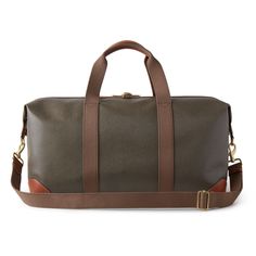 Nothing says 'classic Mulberry' like our Scotchgrain luggage collection. Its beautifully textured surface is accented by smooth leather trim. Travel pieces should be built to last, and look good while doing it. A timeless travel bag in a medium size, this clipper has two short handles and a detachable shoulder strap. Leather trim detailing Two canvas handles with leather detailing Detachable and adjustable canvas shoulder strap Metal feet at the base of bag Detachable luggage tag Internal Mulber Classic Cognac Travel Bag With Leather Lining, Classic Cognac Travel Bag For Business, Classic Cognac Travel Bag For Business Trips, Classic Cognac Business Travel Bag, Classic Cognac Weekender Bag With Leather Lining, Classic Brown Travel Bag With Luggage Sleeve, Classic Cognac Business Duffle Bag, Elegant Cognac Duffle Bag For Travel, Elegant Cognac Travel Bag With Luggage Sleeve