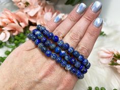 Blue Lapis Lazuli Stretch Mala Beaded Bracelet Luxury Lapis Lazuli Bracelets, Blue 108 Beads Bracelet Jewelry, Lapis Lazuli Bracelets For Meditation, Sapphire Lapis Lazuli Bracelets As Gift, Symbolic Blue Bracelet Jewelry, Blue Lapis Lazuli Crystal Bracelet Gift, Spiritual Sapphire Bracelet Jewelry, Spiritual Hand-strung Evil Eye Bracelet For Healing, Blue Hand Wrapped Spiritual Bracelets