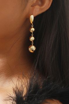 Elevate your style with our 18K Gold-Plated Copper Ball Bead Dangle Earrings, a stunning blend of elegance and durability. Perfect for any occasion, these earrings are designed to add a touch of sophistication to your everyday look. Crafted with precision, the delicate stations adds sophistication. In your choice of Goldstone or Silverstone, you can't go wrong! Whether you’re dressing up for a special event or adding a touch of glam to your everyday attire, these earrings are the perfect accesso Formal Gold-tone Drop Clip-on Earrings, Chic Gold-tone Drop Earrings, Elegant 14k Gold-filled Jewelry With Dangling Beads, Gold-tone Polished Drop Earrings, Gold-tone Gold Plated Dangle Chandelier Earrings, Hair Accessories Gift, Beaded Dangle Earrings, Beaded Dangles, Ring Necklace