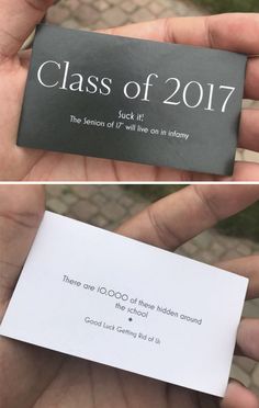 a person holding up a piece of paper that says class of 2017