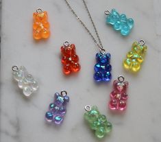 Add a touch of colour to your outfit with these cute Teddy Bear necklaces! The pendant size is 11x17mm The Teddy Bear is made of Acrylic, and placed on a sterling silver chain. Trendy Iridescent Jewelry For Gifts, Cute Iridescent Jewelry For Gift, Cute Multicolor Sterling Silver Jewelry, Playful Silver Necklace For Gifts, Gummy Bear Necklace, Teddy Bear Necklace, Cute Teddy Bear, Resin Ideas, Cute Teddy