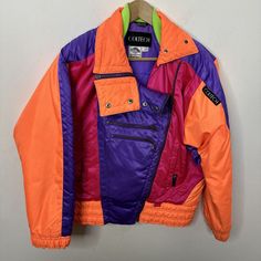 Vintage 80s 90s Neon Collect  Woman 10 L  Anorak Ski Jacket Coat Rad Hot Pink Retro Neon Shoulder to pads  Measures  Pit to pit 25. in  Shoulder to hem 26.5 in  Center of collar to cuff 33.5 in  Condition Very Good  light general wear, there is a small ember mark/hole on rear as per photo Retro Neon, Pink Retro, Ski Jacket, Jacket Coat, Coats Jackets Women, North Face, Coats For Women, Hot Pink, Bomber Jacket