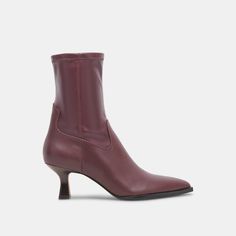 The rich leather wine boot that every closet needs. ARYA brings an earth-friendly approach to the "quiet luxury" trend since she's made with recycled materials. Fall 2025 Fashion Trends, White Heeled Boots, Black Leather Combat Boots, Stacked Heel Boots, Lug Sole Boots, Romanticizing Life, Pointed Toe Boots, Wide Calf Boots, Dolce Vita Shoes