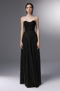 Featuring exquisite embroidery and elegant open shoulders, this dress is perfect for any formal occasion. The A-line silhouette and floor length design create a timeless and sophisticated look. Elevate your style with this exclusive piece. *Note: The length is measured from the chest to the hem. Elegant A-line Evening Gown, Elegant A-line Strapless Formal Dress, Black A-line Evening Gown, Formal Black A-line Maxi Dress, Formal A-line Evening Dress For Prom Season, Elegant Black A-line Gown, Evening Gown With Lined Bodice And A-line Silhouette, Elegant Evening Dress With Lined Bodice For Banquet, A-line Maxi Dress With Lined Bodice For Gala