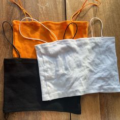 Set Of 3 Orange, Black, And White All L Never Worn $15 For All 3 White Strapless Cotton Crop Top, Chic Cotton Bandeau Tank Top, Casual Black Cami Tube Top, Black Strapless Cotton Crop Top, Zara Stretch Cotton Crop Top, Casual Zara Bandeau Tops, Chic Black Cotton Tube Top, Zara Casual Strapless Tops, Zara Strapless Casual Tops