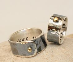 "MORE DESIGNS from ARKETIPO handmade jewelry can be found here: http://www.etsy.com/shop/ARKETIPO These rings are HANDMADE entirely by myself in my workshop. Made from sterling silver, designed, hammered and crafted by hand. Ring 1 is approximately 10mm wide and 1,2mm thick. Ring 2 is approximately 8mm wide and 1,2mm thick. (if you want the rings more or less wide, please firstly contact with me). You can choose words or numbers to be engraved inside of the ring ( choose the font that you like f Sterling Silver Wedding Rings, Mens Gold, Couple Rings, Gold Bands, Wedding Ring Bands, Cuff Bracelets, My Jewellery, Sterling Silver Rings, Wedding Bands