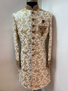 Raw silk white colour sherwani . Enhanced with Resham and zardoshi silver or gold colour. Can be customised in colours matching to bridal lengha. Includes- sherwani and pajama. Designer Wear Fitted White Nehru Jacket, Designer White Fitted Nehru Jacket, Designer Fitted White Nehru Jacket, White Fitted Nehru Jacket For Designer Wear, Semi-stitched White Nehru Jacket For Designer Wear, Traditional White Kurta With Naqshi Drape, Long Sleeve Kundan Traditional Wear For Wedding, White Kurta With Naqshi And Traditional Drape, White Kurta With Naqshi In Traditional Drape