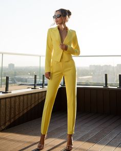 - blazer length 18.1 inches or 46 cm - sleeve length 24 inches or  61 cm - pants length (from waist to ankle) 39 1/3  inches or 100 cm - inseam length (from crotch to the ankle) 29.1 inches or  74 cm  2-piece Womens Blazer Trouser Suit for office, business meetings, formal events and special occasions. Also perfectly combines with sneakers so after a long and tiring business day you can change you heels to sneakers and still look chic. DETAILS -  slim fit pants -  cropped  -  high rise -  blazer is buttoned -  lined -  no pockets -  single breasted MATERIAL Premium quality Suiting fabric, consists of viscose mostly and a bit of polyester and elastane  SIZES The models in photos are wearing a size S Available in 4 sizes: XS= 0 US numeric  BUST 32-34 inches or 82-86 cm WAIST 23-24.8 inches o Tailored Notched Pantsuit For Spring, Single Breasted Fitted Sets For Workwear, Fitted Single Breasted Sets For Workwear, Tailored Spring Pantsuit With Notched Lapels, Spring Office Pantsuit With Suit Collar, Notched Pantsuit For Office Wear In Spring, Spring Office Wear Notched Pantsuit, Spring Office Pantsuit With Notched Lapel, Spring Notched Pantsuit For Office Wear