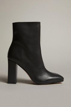 Leather Heeled Ankle Boot Fall Ankle Heeled Boots With Contrasting Heel, Classic Fall Heeled Boots With Block Heel, Classic Block Heeled Boots For Fall, Classic Block Heel Boots With Padded Heel, Classic Heeled Boots With Padded Block Heel, Classic Block Heeled Boots With Padded Heel, Classic High Heeled Boots With Stacked Heel, Classic Winter Platform Boots With Square Toe, Classic Square Toe Boots With Branded Heel