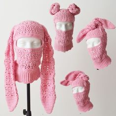 pink knitted hats and scarfs on display with white mannequin headdress