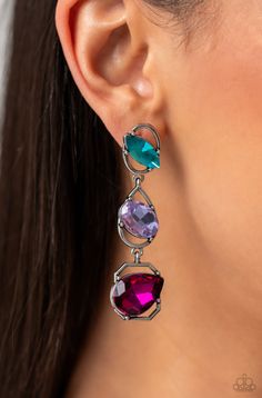 Linking together to create a geometric lure, a sleek silver oval, teardrop, and emerald-cut frame cascade down the ear. Slanted sideways in pronged settings across each frame, a fuchsia teardrop, purple oval-cut, and aquamarine marquise-cut gem create a gorgeous pop of color against the thin edgy frames. Earring attaches to a standard post fitting. Sold as one pair of earrings. Dance Earrings, Multicolor Earrings, Paparazzi Accessories, White Necklace, Blue Gems, Paparazzi Jewelry, Rhinestone Earrings, Emerald Cut, Aquamarine