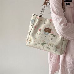 Brand Name: IMYOKHandbags Type: Shoulder BagsTypes of bags: Shoulder & HandbagsMain Material: PolyesterLining Material: PolyesterShape: Casual TotePlace Of Origin: GUANG DONG ProvincePlace Of Origin: GUANG DONG ProvinceOrigin: Mainland ChinaCN: GuangdongHardness: SoftPattern Type: FloralInterior: No PocketOccasion: VersatileClosure Type: HaspGender: WOMENStyle: FashionModel Number: u42703Number of Handles/Straps: Two Large Capacity Square Canvas Bag For Spring, Spring Large Capacity Square Canvas Bag, Trendy Floral Print Tote Shoulder Bag, Spring Square Canvas Bag For Daily Use, Flower-shaped Shoulder Bag For Everyday Use, Rectangular Floral Print Shoulder Bag For Everyday Use, Trendy Square Canvas Bag For Spring, Trendy Floral Print Travel Shoulder Bag, Chic Flower-shaped Shoulder Bag For Everyday Use