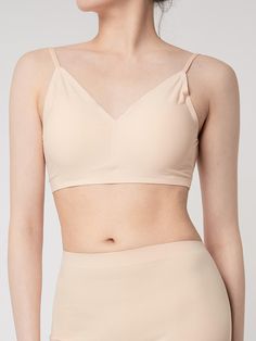 Composition : 85% nylon, 15% spandex, Pad shall :100% cotton, Pad inside: urethane foamColor : beige, white, blackCountry of Origin : China Elegant Seamless Stretch Crop Top, Elegant Stretch Seamless Crop Top, Low-cut Crop Top With Built-in Bra, Beige Stretch Sports Bra With Built-in Bra, Basic Stretch Crop Top Bra-friendly, Basic Stretch Crop Top, Bra-friendly, Solid Color Low-cut Sports Bra With Removable Pads, Elegant Seamless Camisole Crop Top, Solid Color No-show Bra With Minimal Stretch