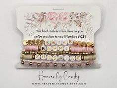 5 stack faith-based pink and gold bracelets. Bracelets arrive in a cello bag which is placed into a blush-colored gift bag, ready for giving Inspirational Pink Round Beads Jewelry, Inspirational Pink Beaded Bracelets For Gift, Inspirational Pink Beaded Bracelets As Gift, Everyday Inspirational Pink Bracelets, Inspirational Pink Bracelet With Adjustable Fit, Inspirational Pink Adjustable Bracelets, Inspirational Pink Adjustable Bracelet, Inspirational Pink Beaded Bracelets For Mother's Day, Inspirational Pink Bracelet As A Gift