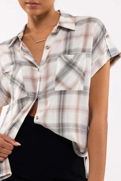 Luxuriate in the exquisite charm of our Plaid Woven Top. Crafted with an elegantly-designed collar neckline and button-down design, it features a chest pocket and folded-sleeve cuffs, and is finished with a tab sleeve for a tailored silhouette. The plaid print adds a timeless, classic appeal, and its 100% rayon fabric ensures a soft feel for a look and feel of effortless sophistication. Plaid Spread Collar Top With Pockets, Plaid Top With Pockets And Spread Collar, Collared Office Tops With Buttoned Pockets, Collared Tops With Buttoned Pockets For Office, Office Tops With Collared Buttoned Pockets, Office Tops With Buttoned Pockets And Collar, Collar Blouse With Pockets For Daywear, Collared Work Shirt With Pockets, Collared Tops With Pockets For Office