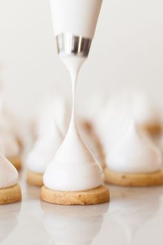 cookies with icing being poured onto them