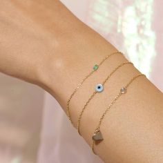 Evil Eye Bracelet – STONE AND STRAND Gold Evil Eye Bracelet, Floating Diamond Necklace, Stone And Strand, Diamond Initial Necklace, Greek Evil Eye, Dainty Diamond Necklace, Bracelet Stone, Diamond Choker, Spiral Earrings