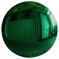 an image of a green mirror on a white background