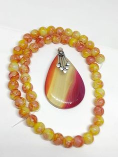 natural gemstone Yellow Agate Jewelry With Natural Stones, Yellow Agate Gemstone Jewelry, Spiritual Agate Pendant Gemstones, Artisan Round Agate Gemstones, Healing Agate Pendant Gemstone, Agate Gemstone Beads Pendant, Handmade Round Agate Gemstones, Orange Agate Cabochon Jewelry, Amber Cabochon Agate Jewelry