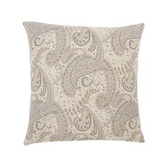 the paisley print pillow is shown in beige and grey tones, with an intricate pattern on it